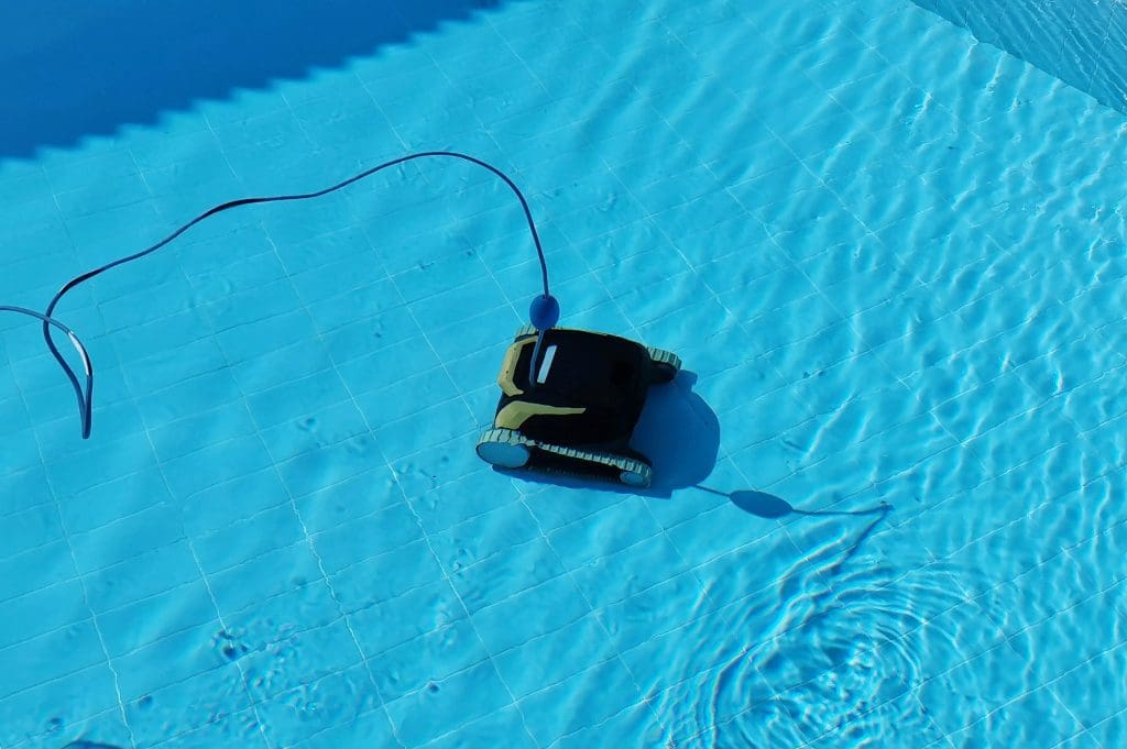 Robotic pool cleaner under water.